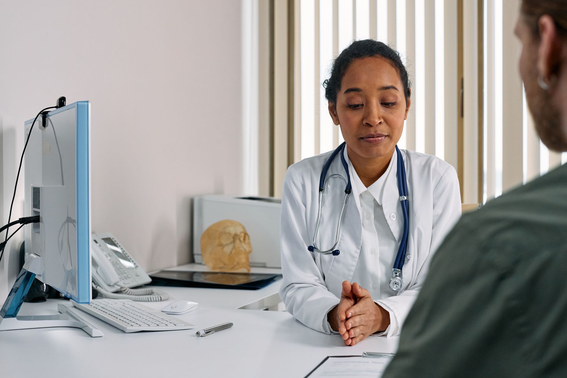 Cardiologist consulting a patient about heart failure management