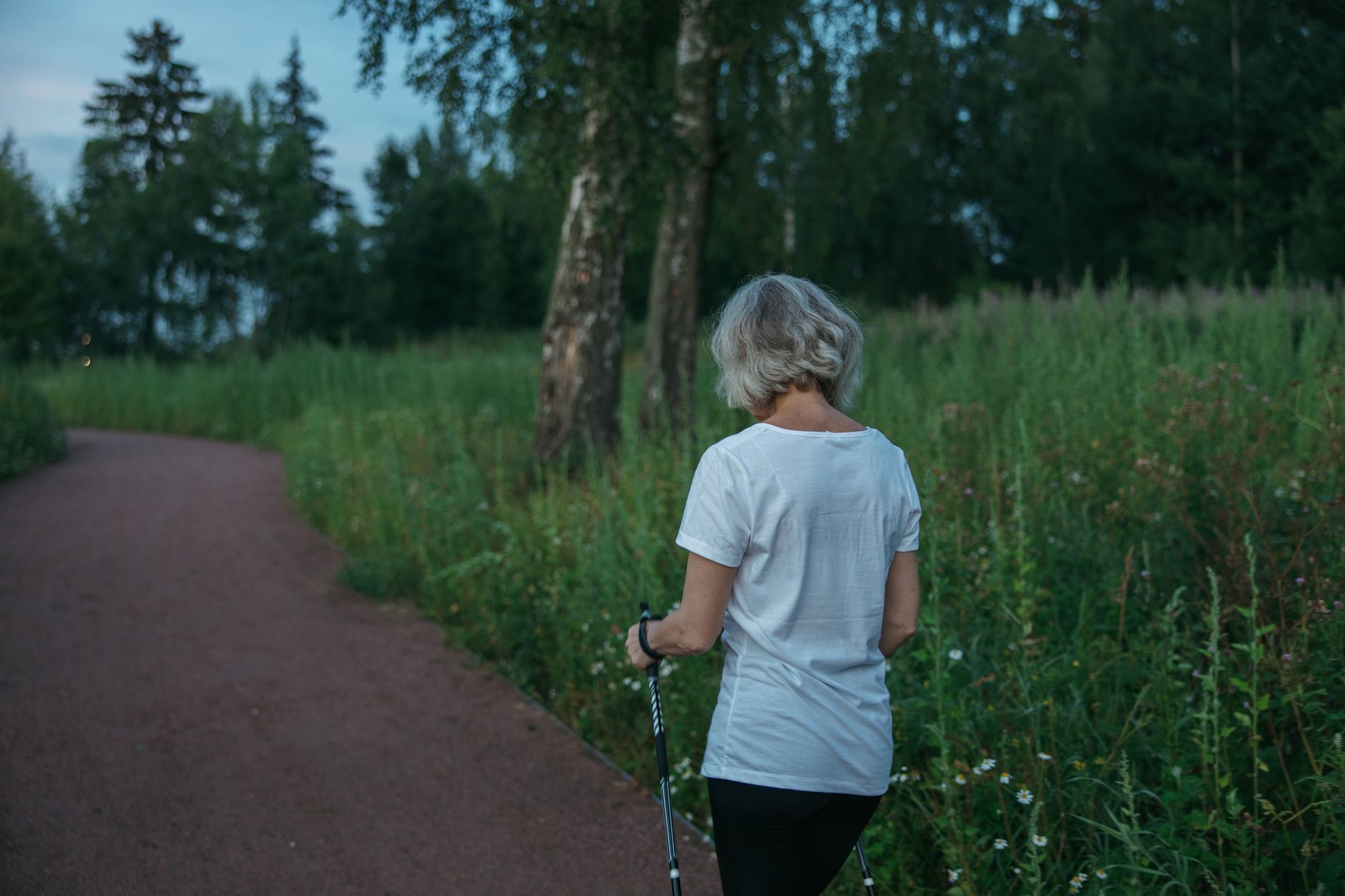 Patient enjoying a gentle walk outdoors during cardiac recovery