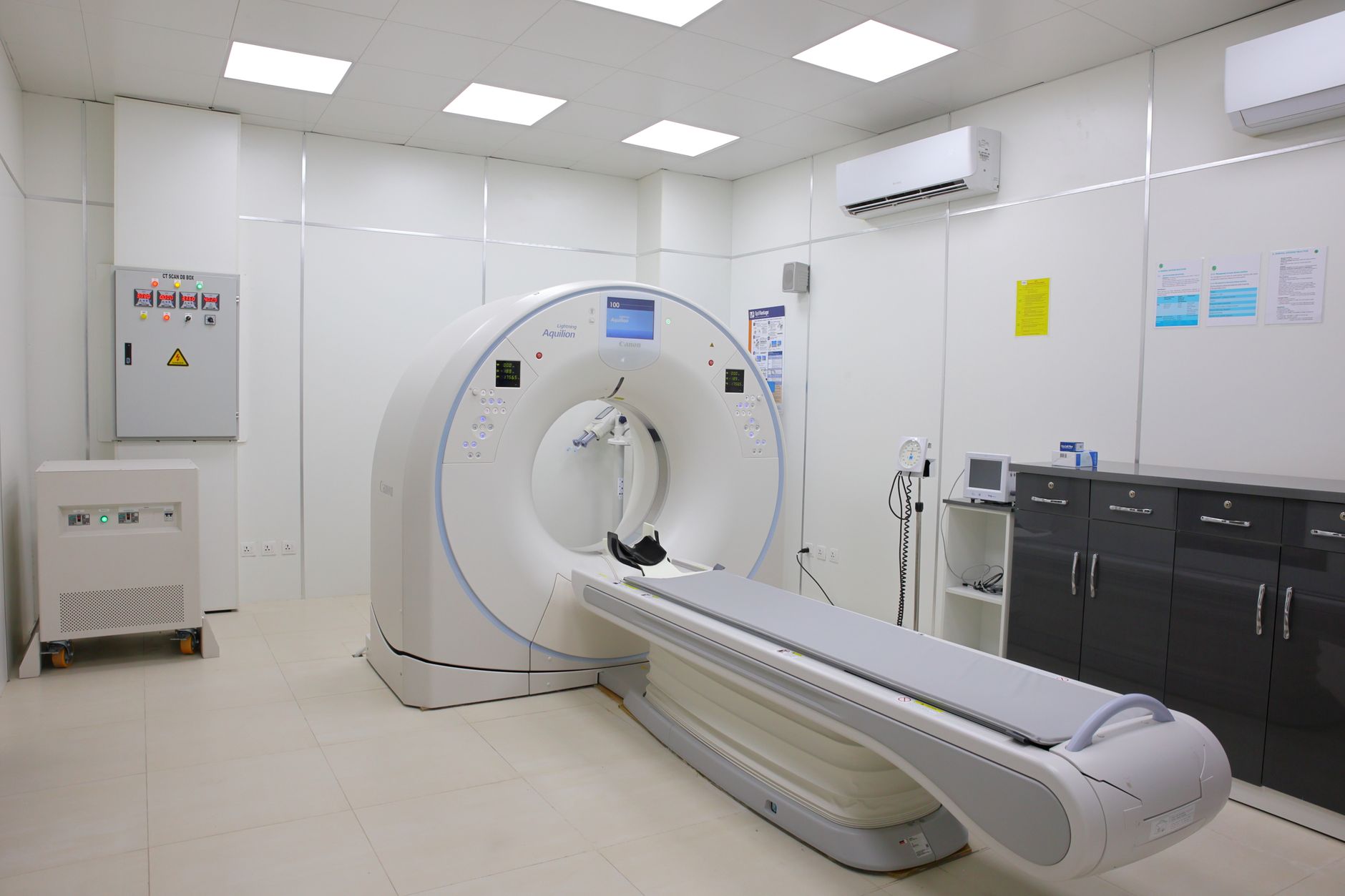 A modern CT scanner in a hospital radiology department used for cardiac imaging
