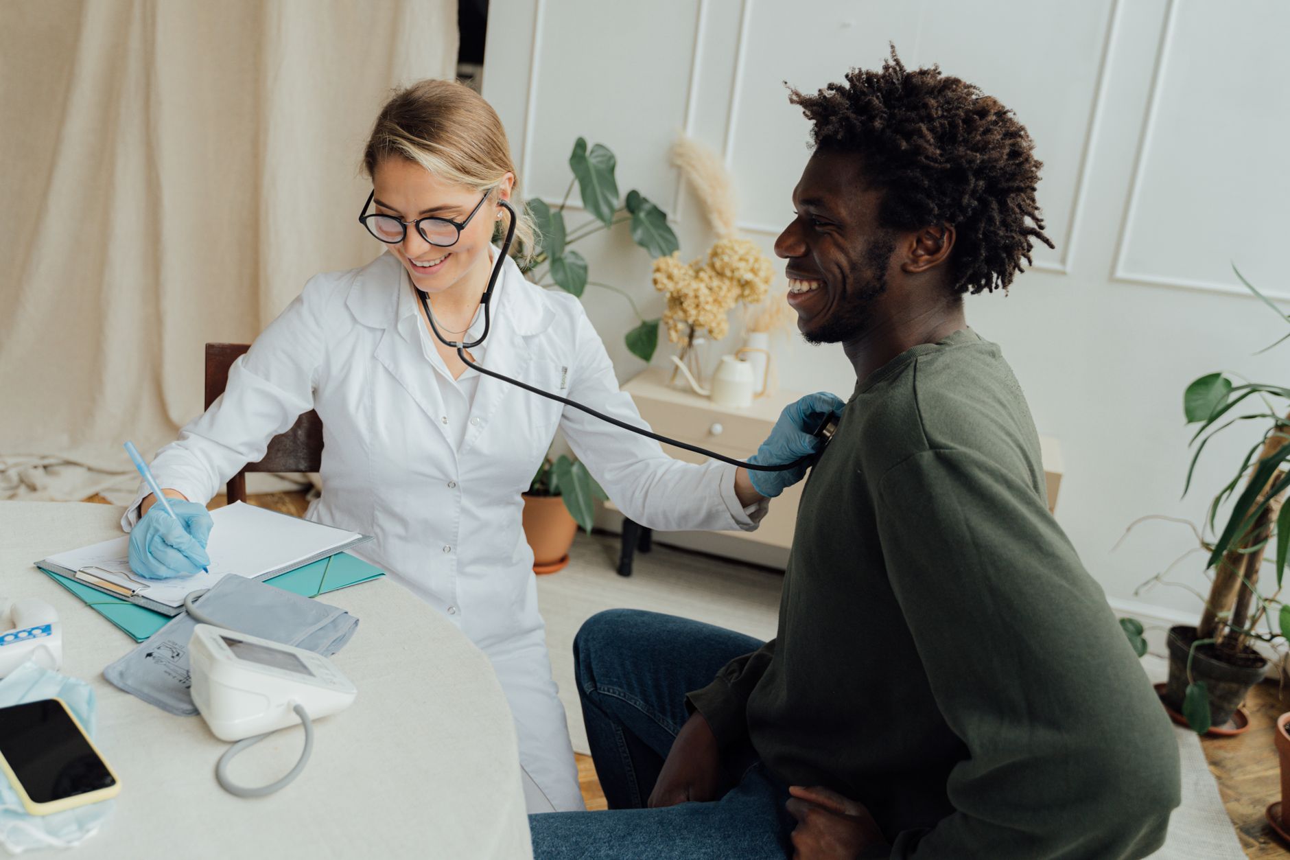A cardiologist checking a patient's heart rate before exercise clearance