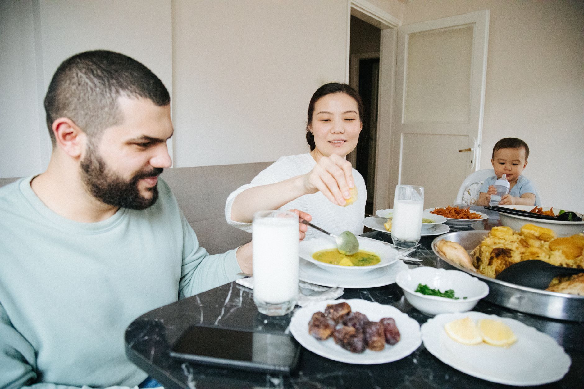 A healthy family enjoying a nutritious meal together, supporting heart-healthy lifestyle habits