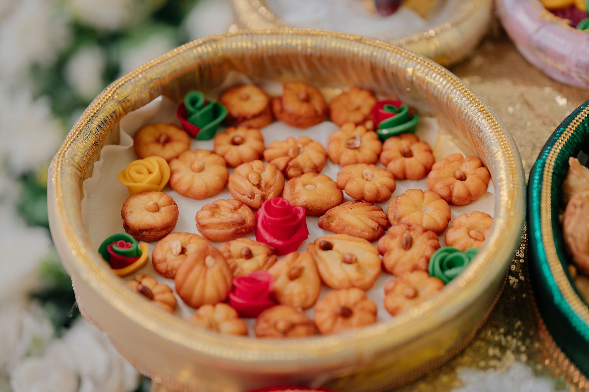 A platter of colourful Indian festive sweets and snacks