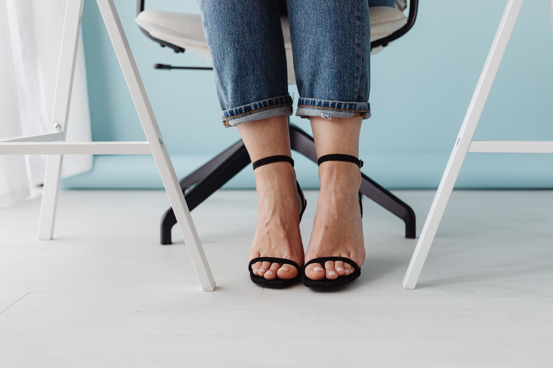 Close-up of swollen ankles and feet, a common sign of fluid retention in heart failure