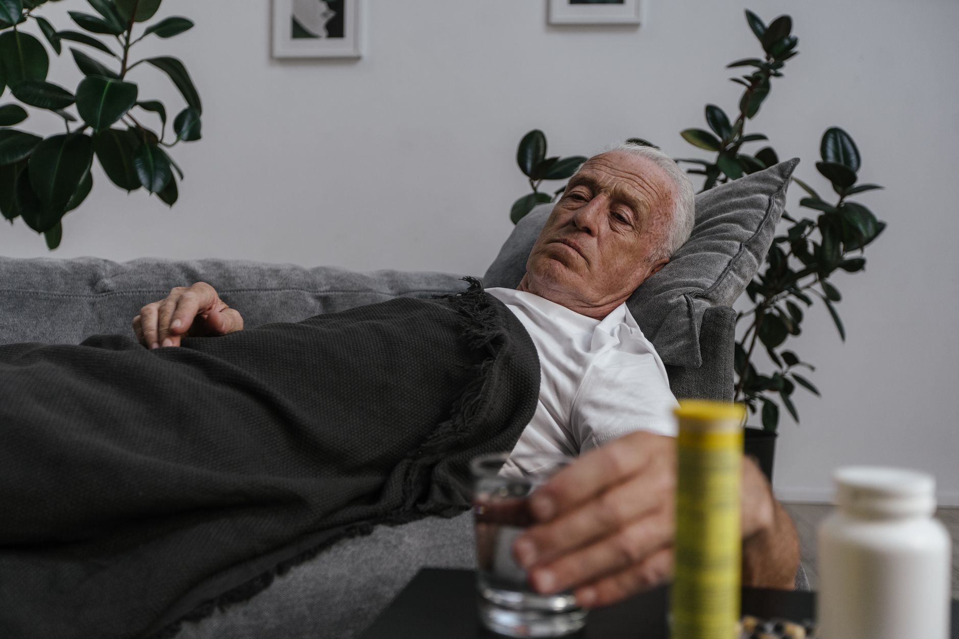 A senior woman appearing fatigued and unwell, representing less obvious heart attack symptoms in women