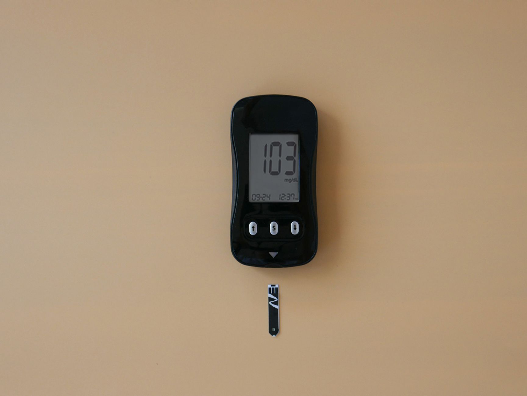 Home monitoring devices including a blood pressure monitor and glucose meter for managing chronic conditions