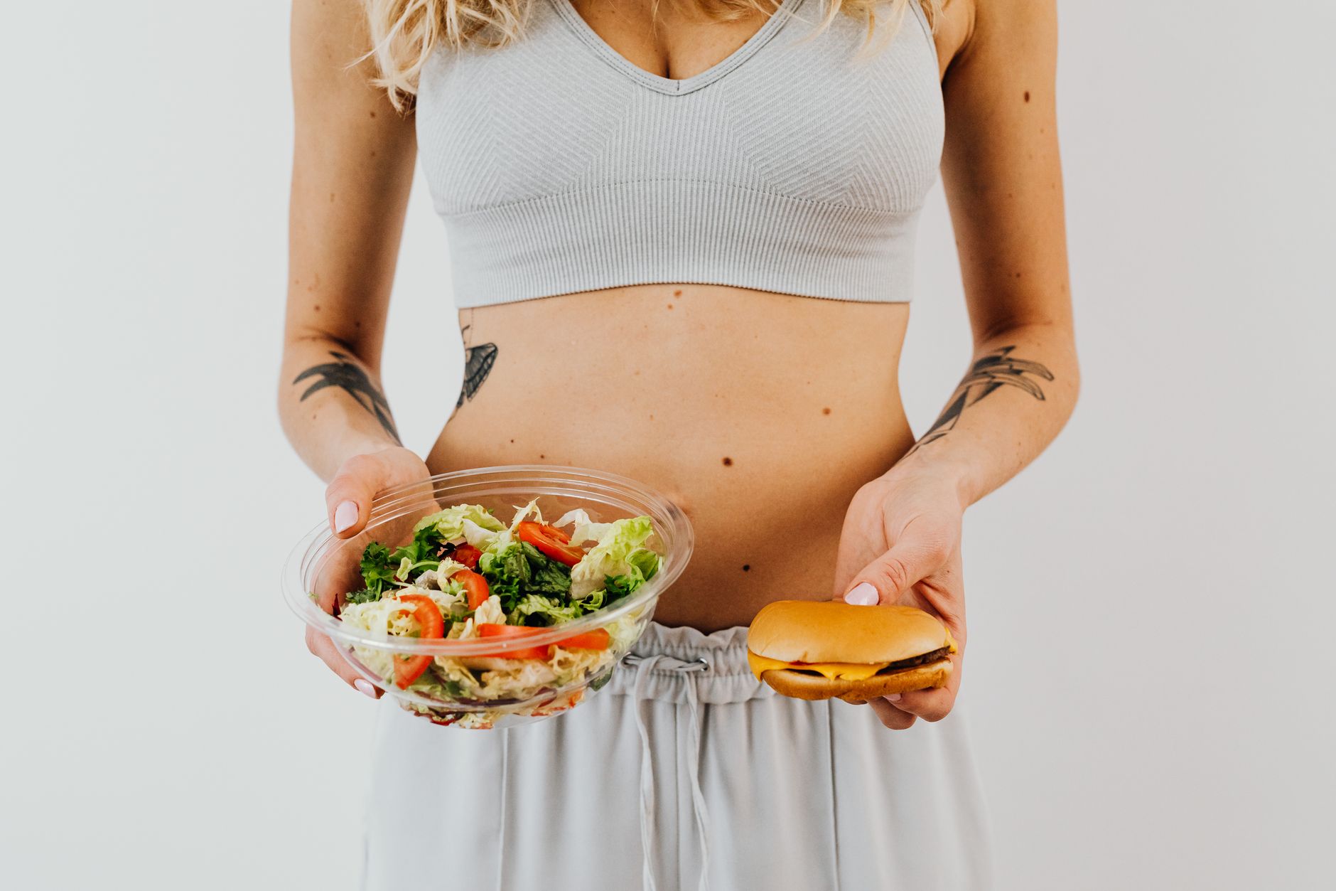 A comparison of heart-healthy foods and high-fat foods on a table