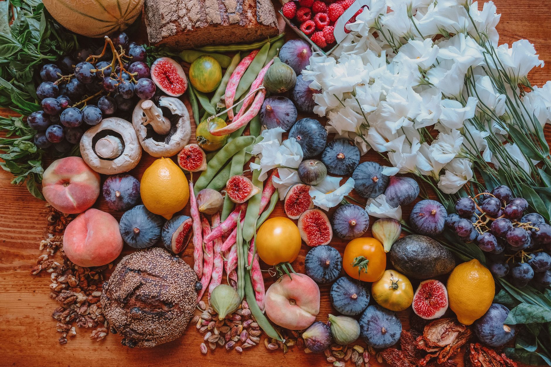 A spread of heart-healthy foods including fruits, vegetables, and nuts