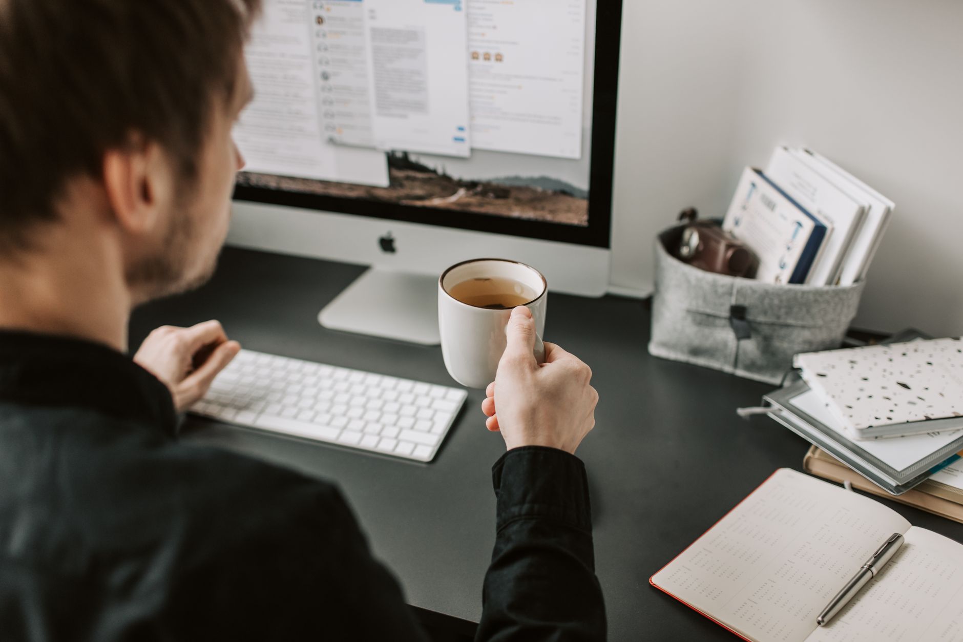 A person working comfortably at a desk during a phased return to work
