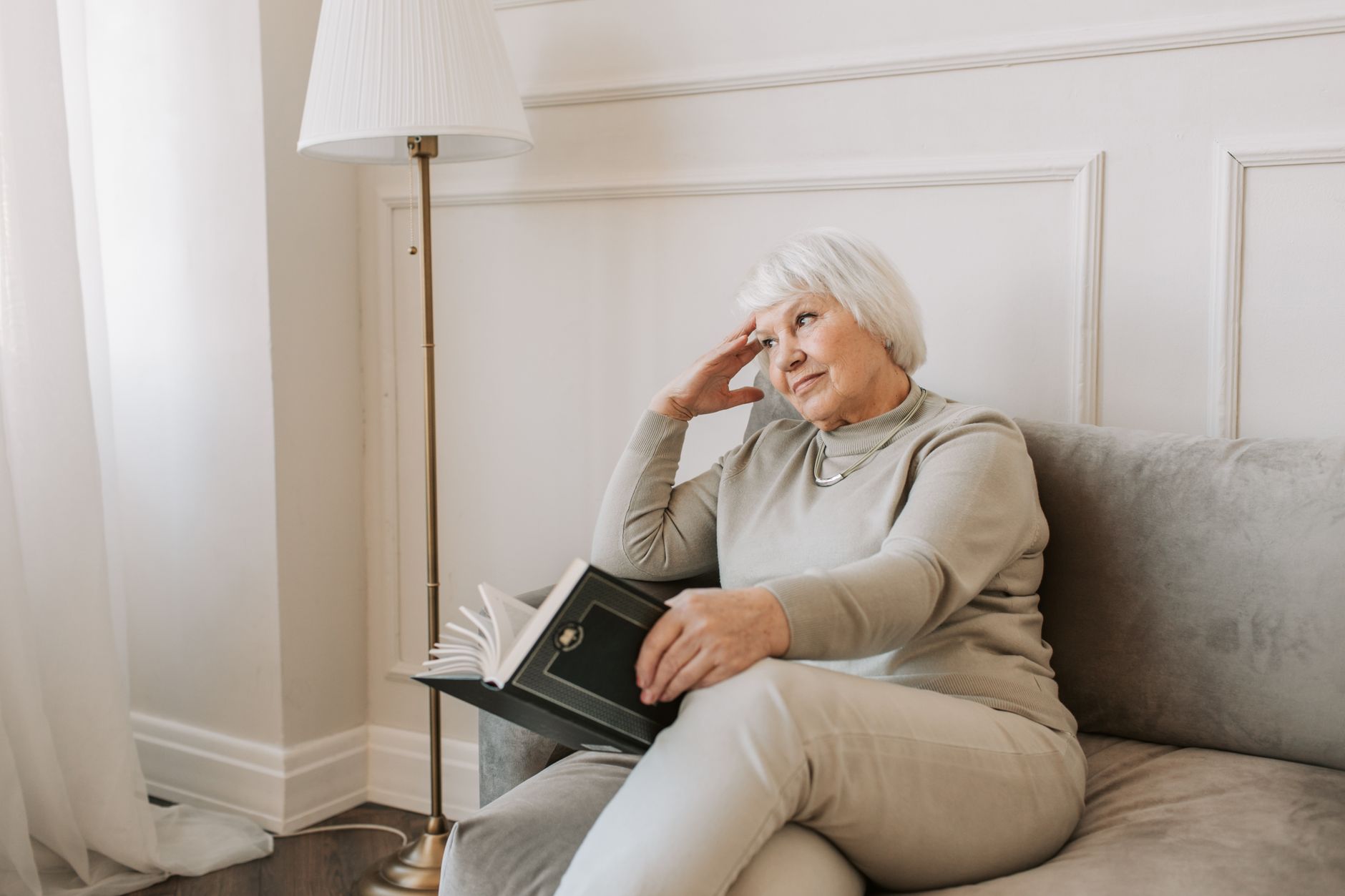 An older woman experiencing unexplained fatigue, a subtle silent heart attack symptom