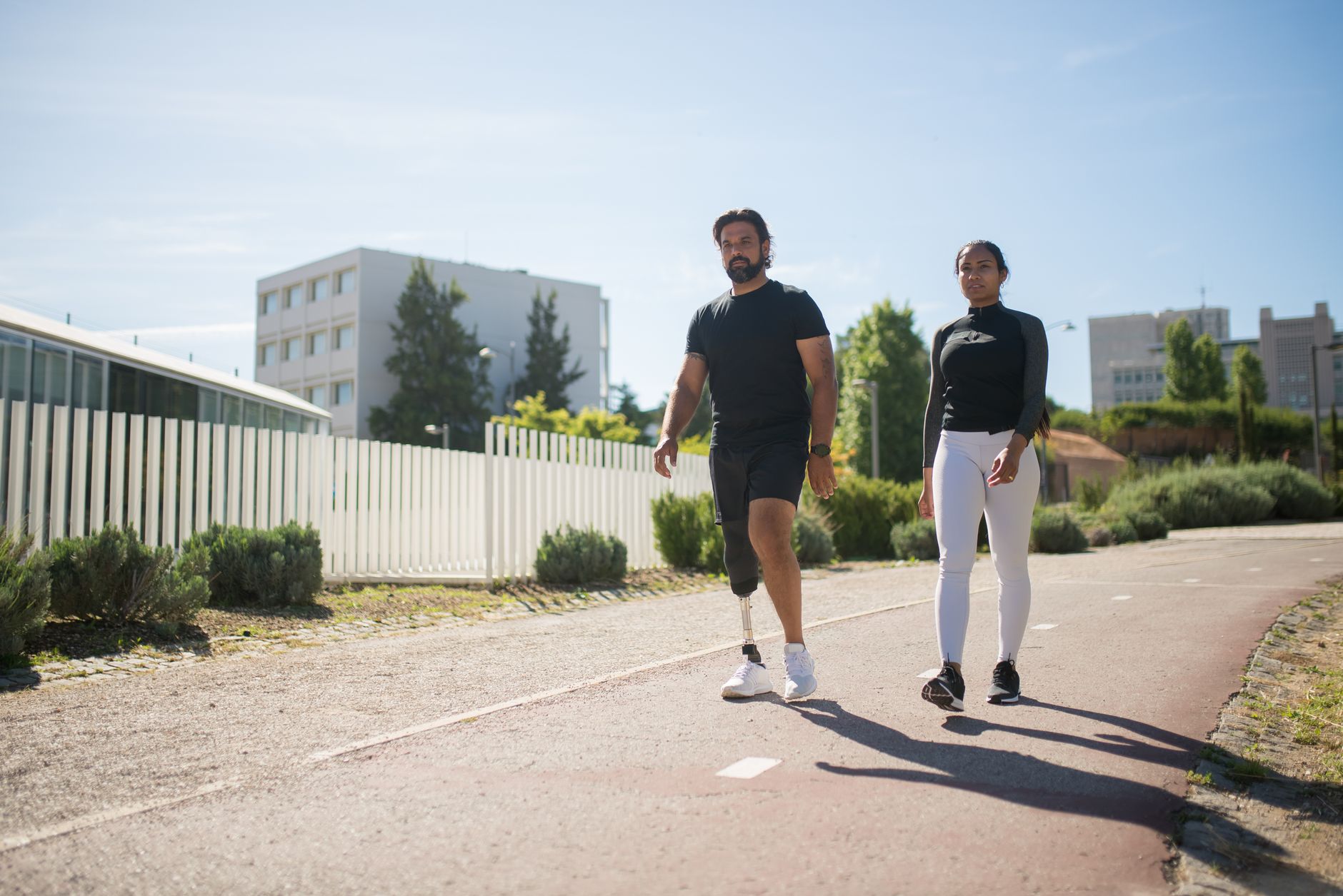 Woman taking a gentle walk in a park during cardiac recovery