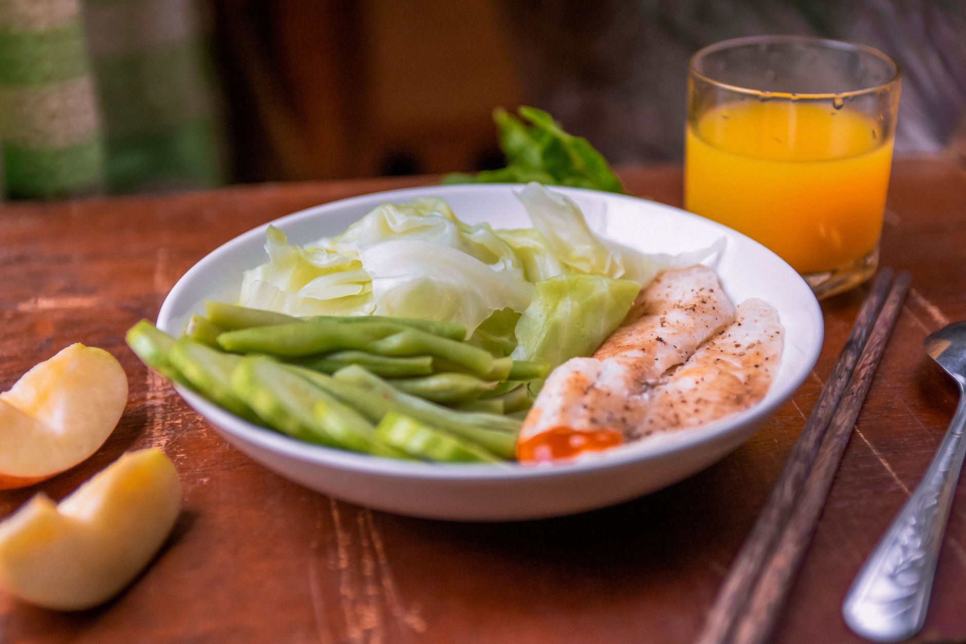 A colourful plate of heart-healthy Indian foods including vegetables, lentils and fruits