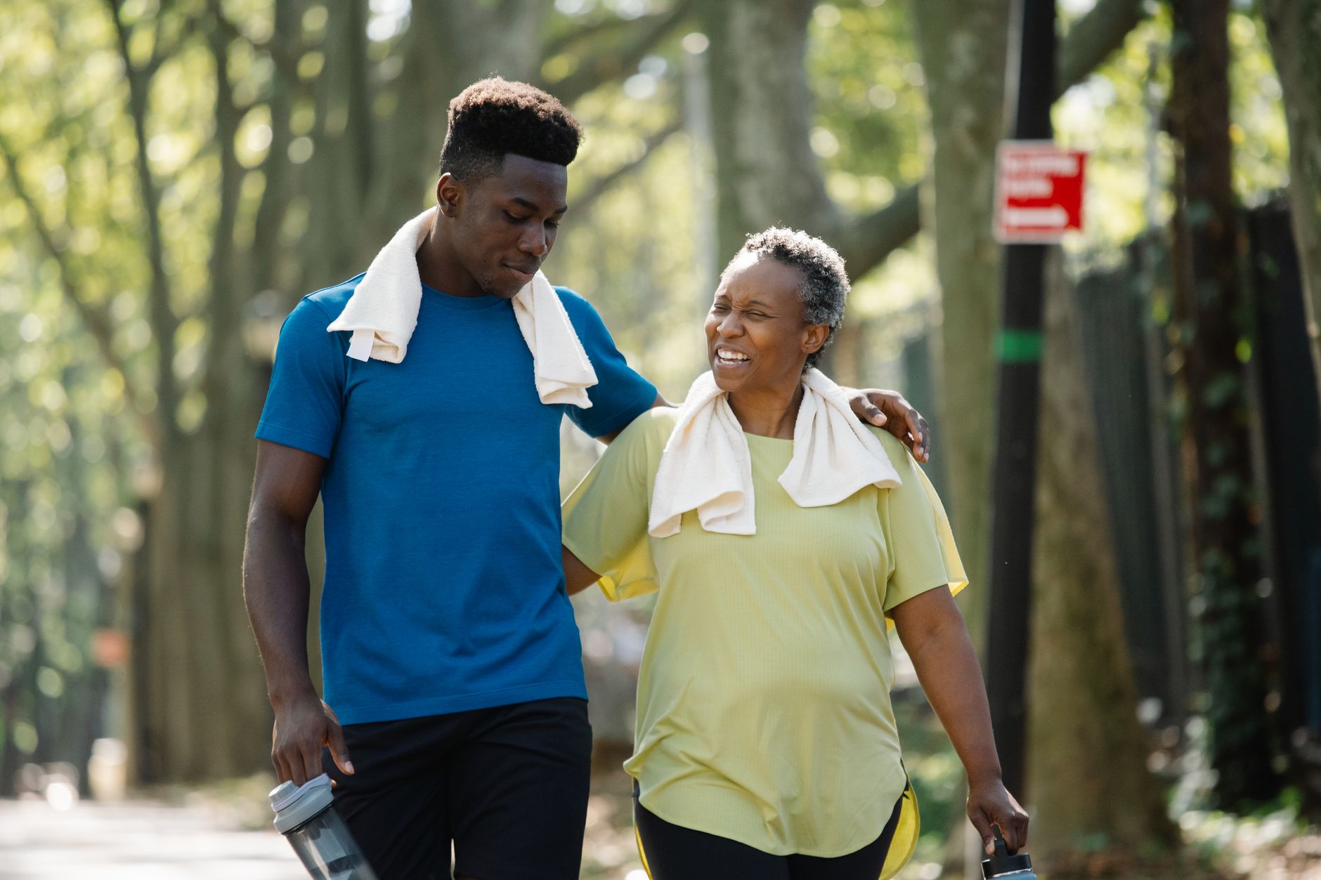 An elderly man doing his morning walk in a park, supporting heart health alongside medication