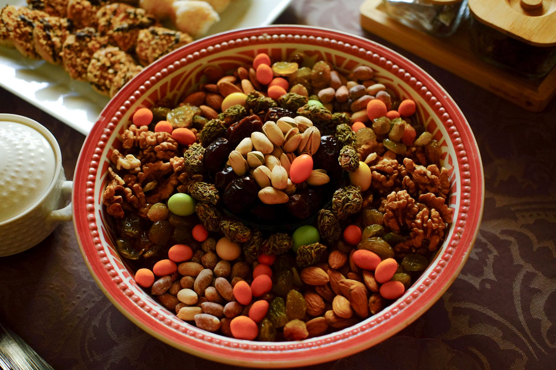 A plate of fresh fruits, nuts and light snacks suitable during a religious fast