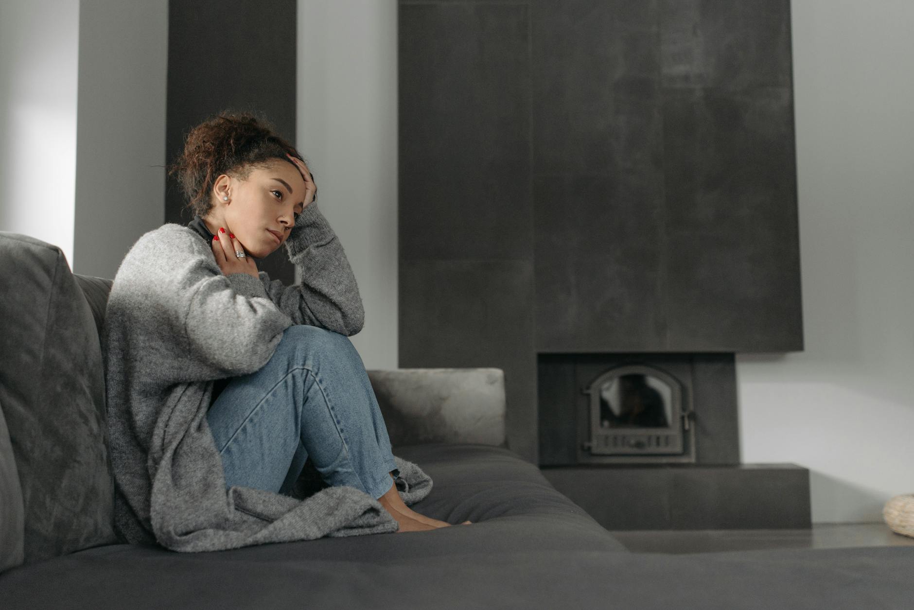 A woman experiencing unexplained fatigue, an often-overlooked heart symptom